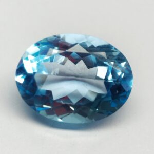 BLUE TOPAZ OVAL CUT 11x15MM -9.90 CARAT - Ravi Ratnesh