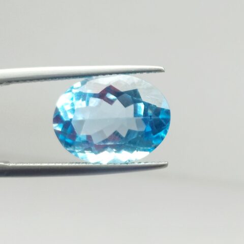 BLUE TOPAZ OVAL CUT 11x15MM -9.90 CARAT - Ravi Ratnesh